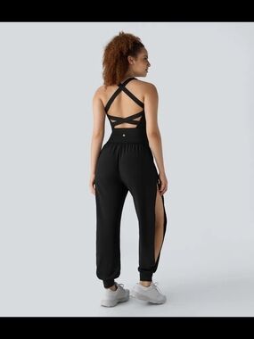 HALARA Black Split-Leg Jogger Jumpsuit with Strappy Open Back
